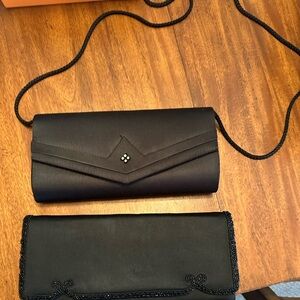 2 black special occasion purses. You get both purses for $7